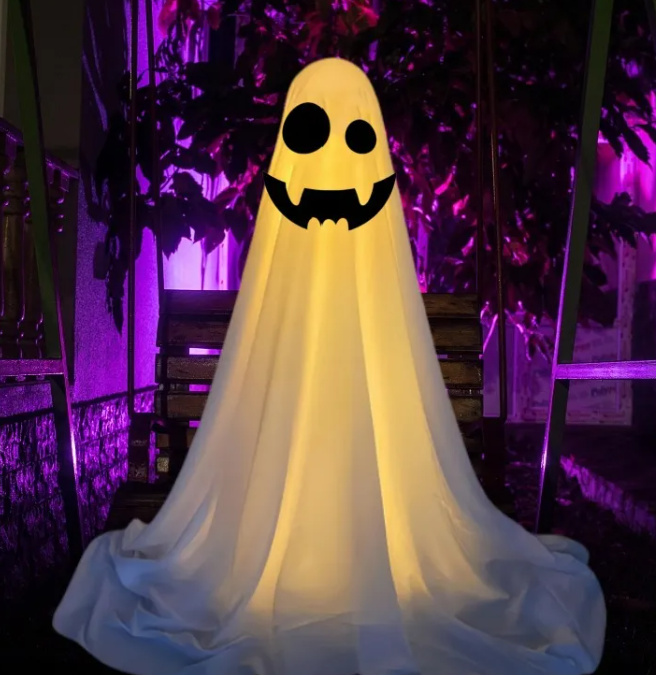 Hanging cloth ghost decoration with round eyes and a fanged smile
