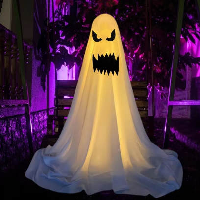 Hanging cloth ghost decoration with angry slanted eyes and a large fanged grin