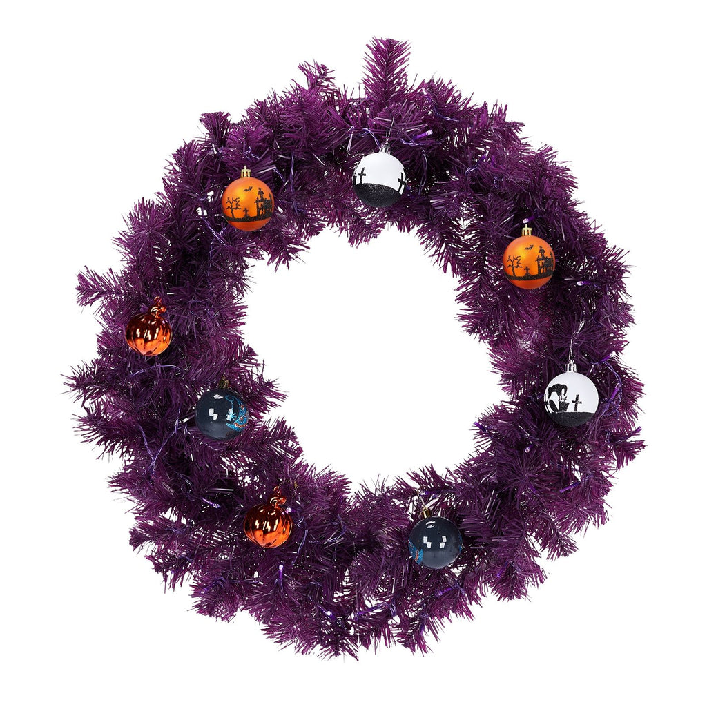 24 inch purple Halloween wreath with clip-on pumpkin, ghost and black cat ornaments, shown unlit on white