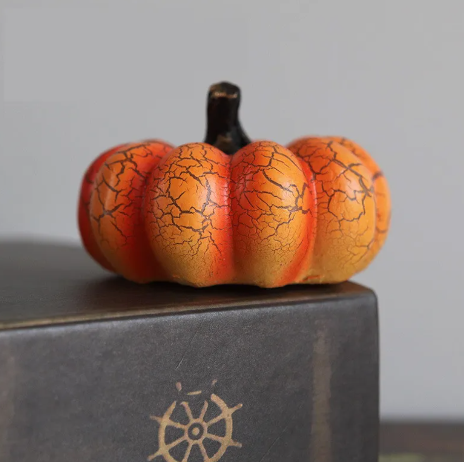 Wide crackle-glazed resin pumpkin showing the crackle texture across its ribs