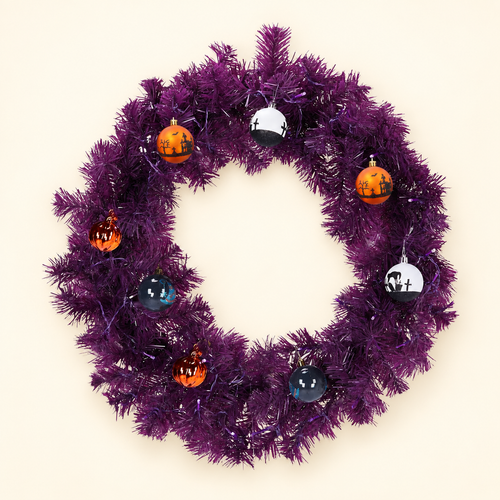 Purple Halloween wreath with small Halloween ornaments, shown individually against a warm cream background